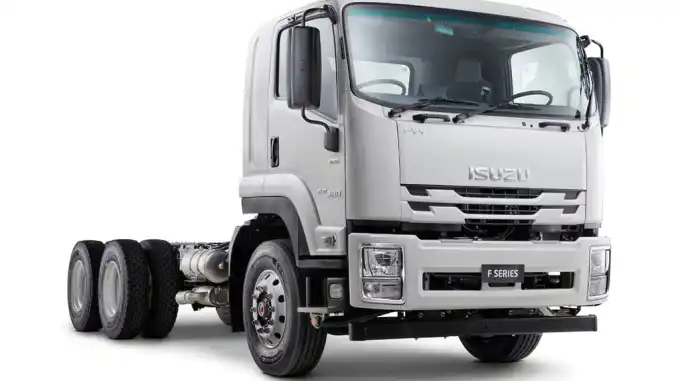 A new Isuzu F Series  Heavy-Duty Truck on a white background in a studio.