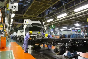 The assembly line at an Isuzu truck manufacturing facility